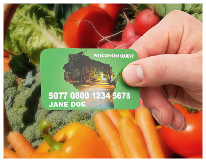 photo of a hand holding a Wisconsin Quest card