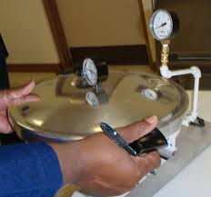 pressure canner gauge being tested